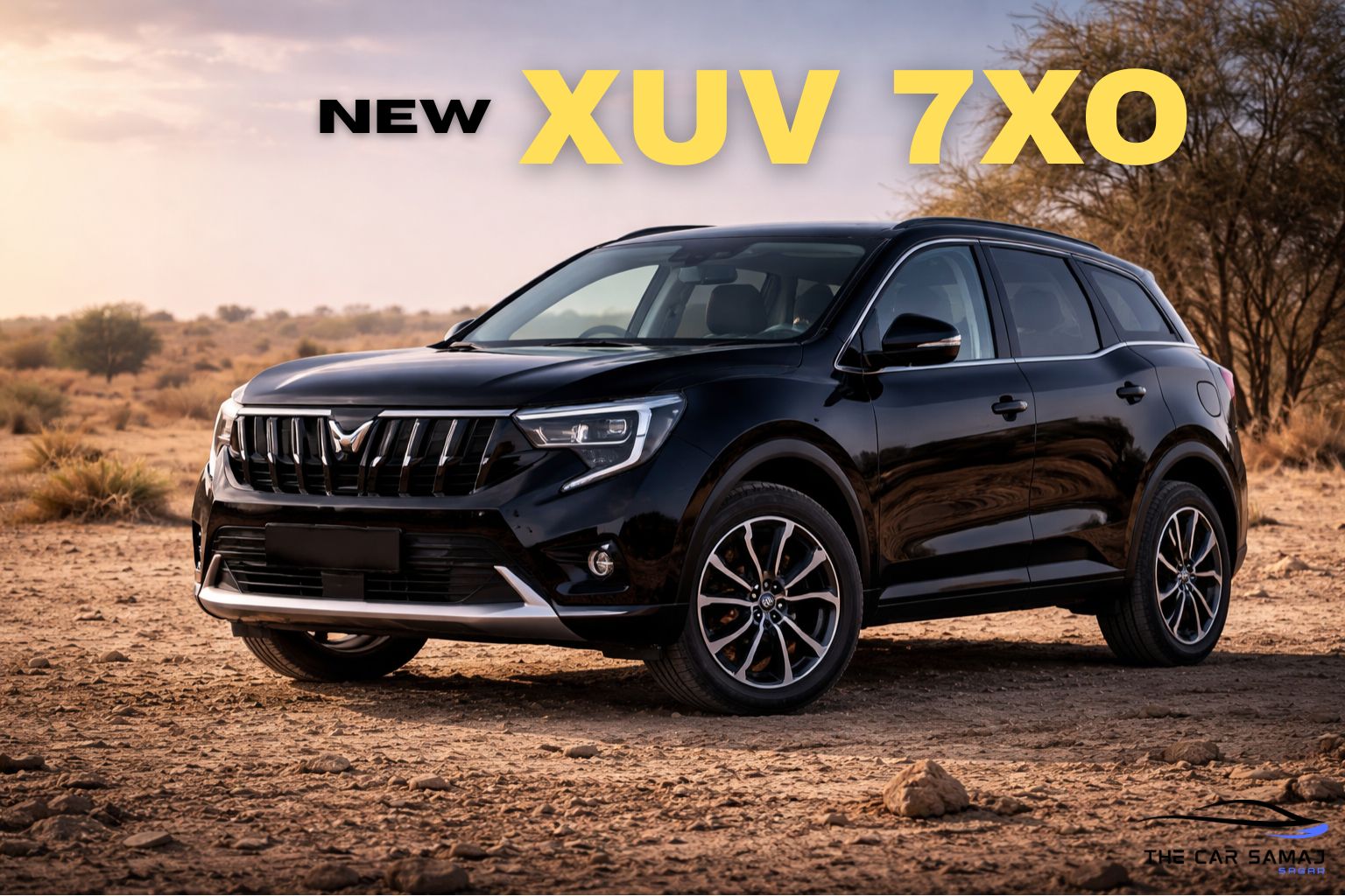 Mahindra XUV 7XO black SUV parked on open desert terrain with rugged background, front three-quarter view, modern grille and alloy wheels clearly visible.