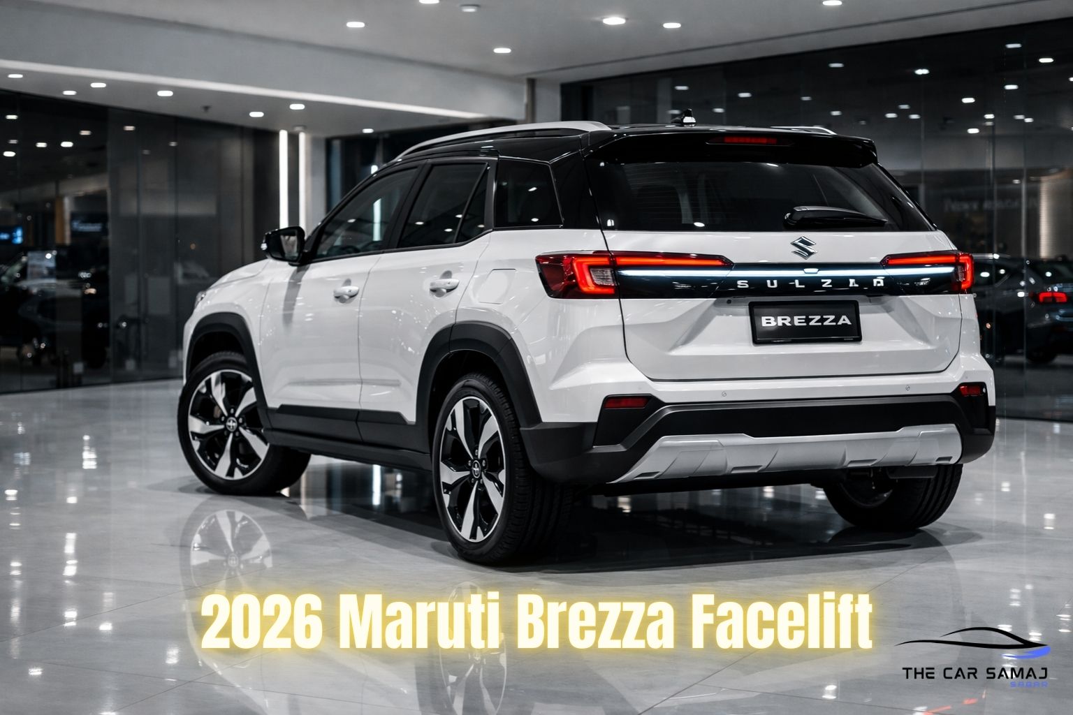 2026 Maruti Brezza Facelift rear view in white with black roof parked inside a premium showroom with connected LED tail lights